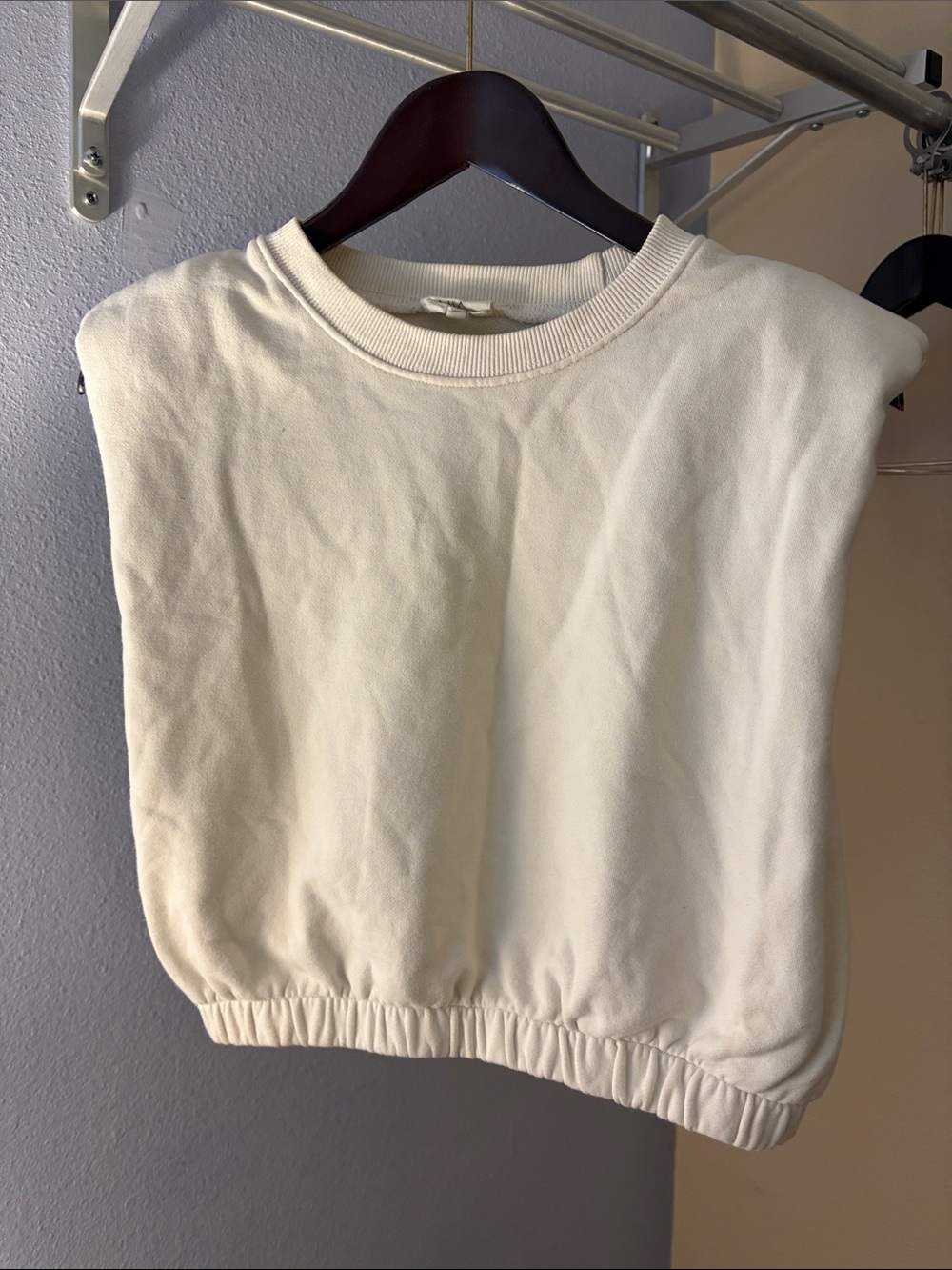 Sleeveless Cream Crop Structured Sweatshirt Top